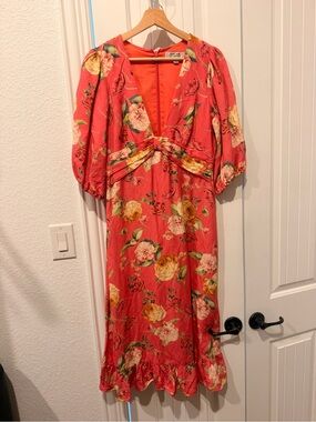 kahlani floral print long sleeve midi dress Meet the Kahlani Printed Midi Dresspretty, feminine, and oh-so-charming! Perfect for garden parties or a dreamy spring wedding. Your next fave look is here!